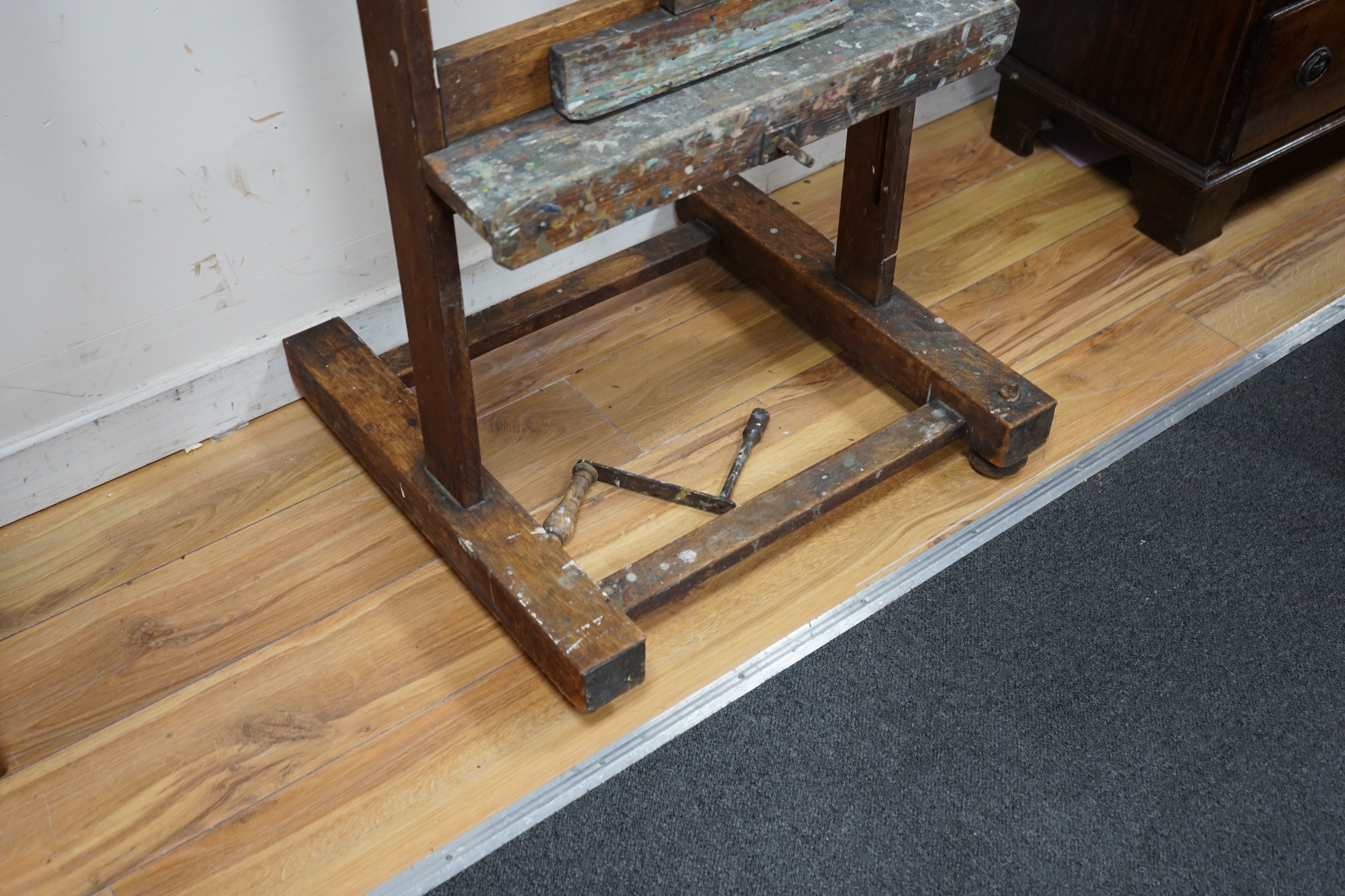 A Victorian oak adjustable artist's studio easel, by Reeves & Son, height 67cm